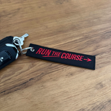 RUN THE COURSE Jet Tag
